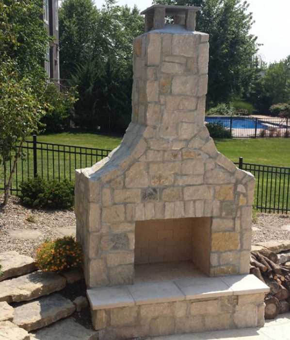 Outdoor fireplace. Home Additions. Johnson County Remodeling.