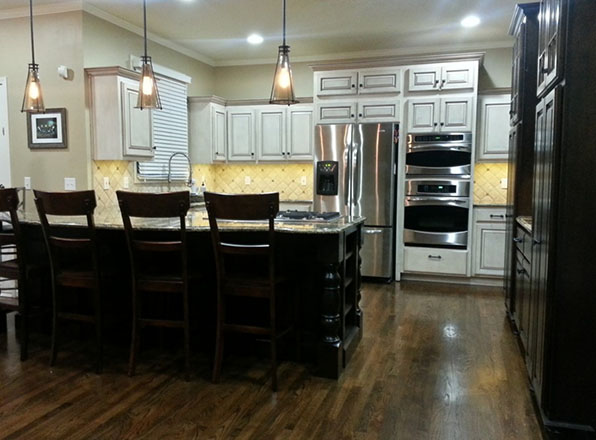 Kitchen Remodeling with two stacked stoves. Johnson County Remodeling.