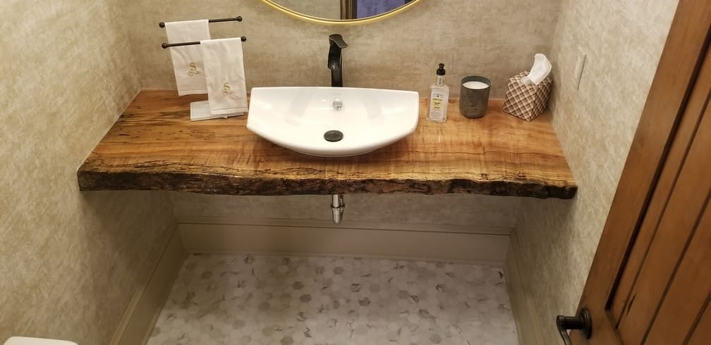 Natural Wood Counter Top with sink. Bathroom Remodeling. Johnson County Remodeling.