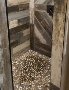 wood, stone, natural materials shower design trends